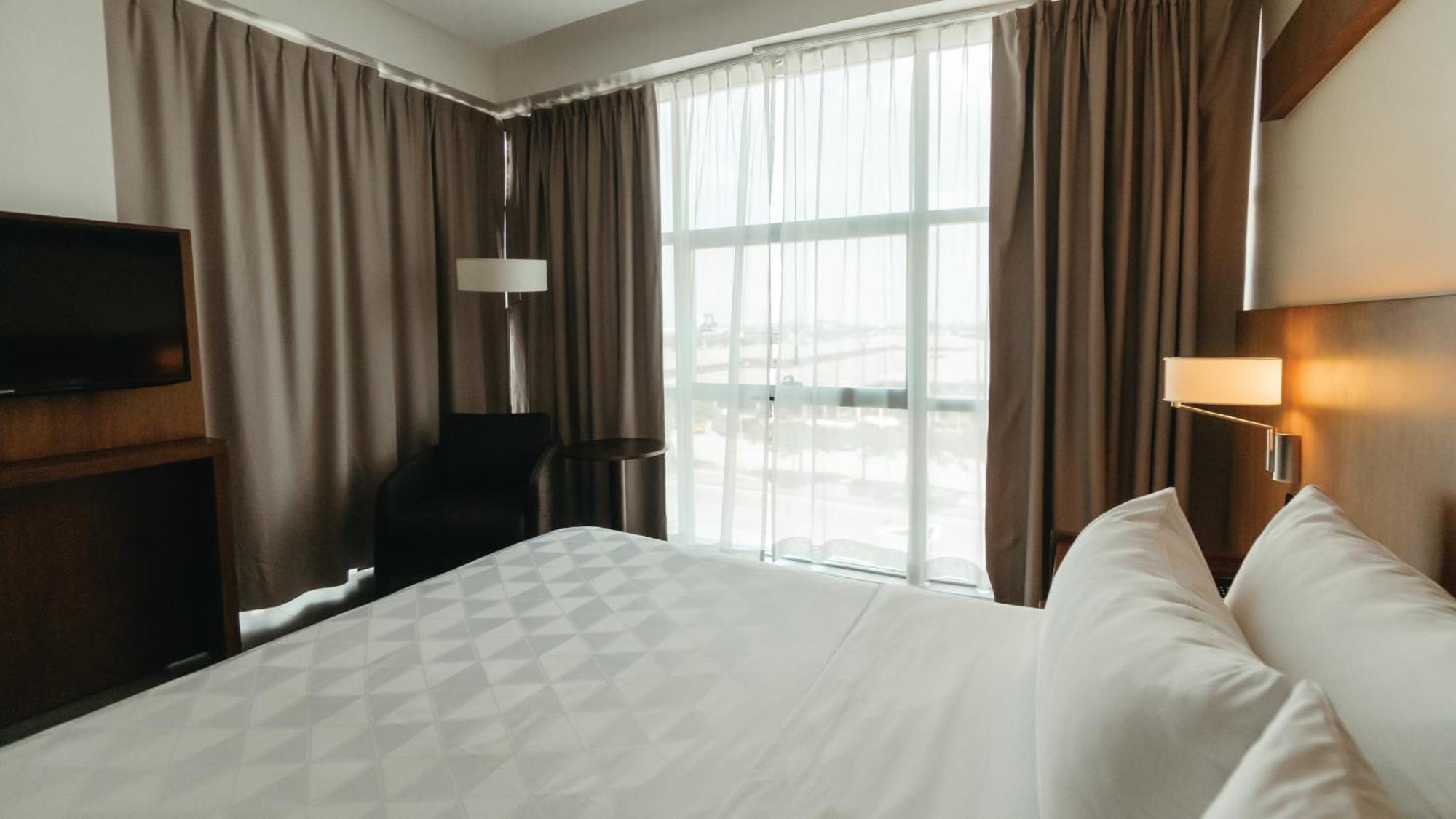 Holiday Inn Guayaquil Airport By Ihg Ngoại thất bức ảnh A bedroom at the hotel